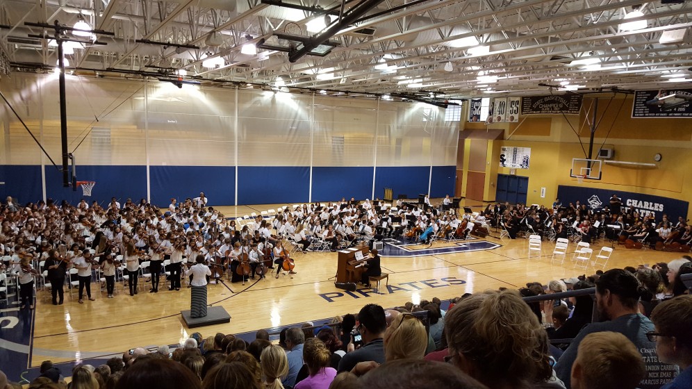 Left to right: Elementary, middle, and high school orchestras.