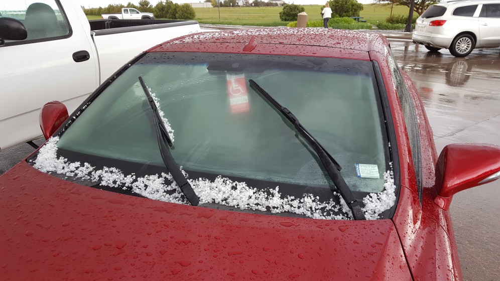 Hail accumulating on the windshield
