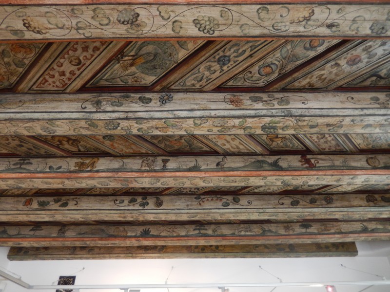 Eating a sweet roll was no hardship to get a good look at this ceiling artwork.