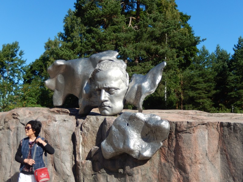 A sculpture of Sibelius, complete with Asian tourist.