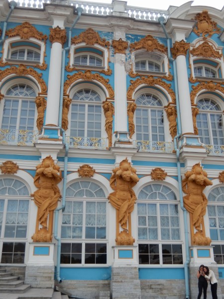 The front of Catherine's Palace has statues of Atlas holding up the pillars for the second floor of the building.